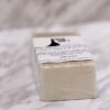 oatmeal goat milk soap laying down clear shrink wrap with label